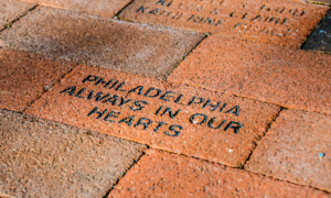 A custom commemorative brick in the Betsy Ross House courtyard
