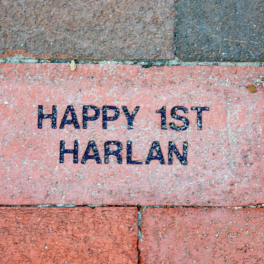 A custom commemorative brick in Franklin Square that reads 
