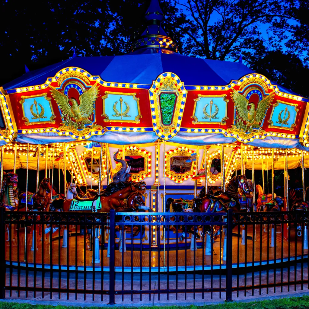 The Franklin Square carousel lit up at night