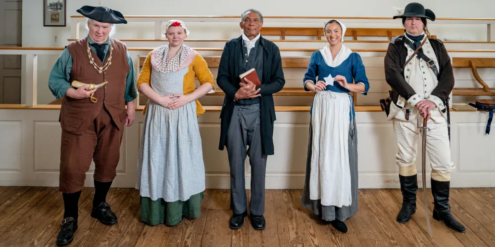 A group of costumed History Makers, including Betsy Ross