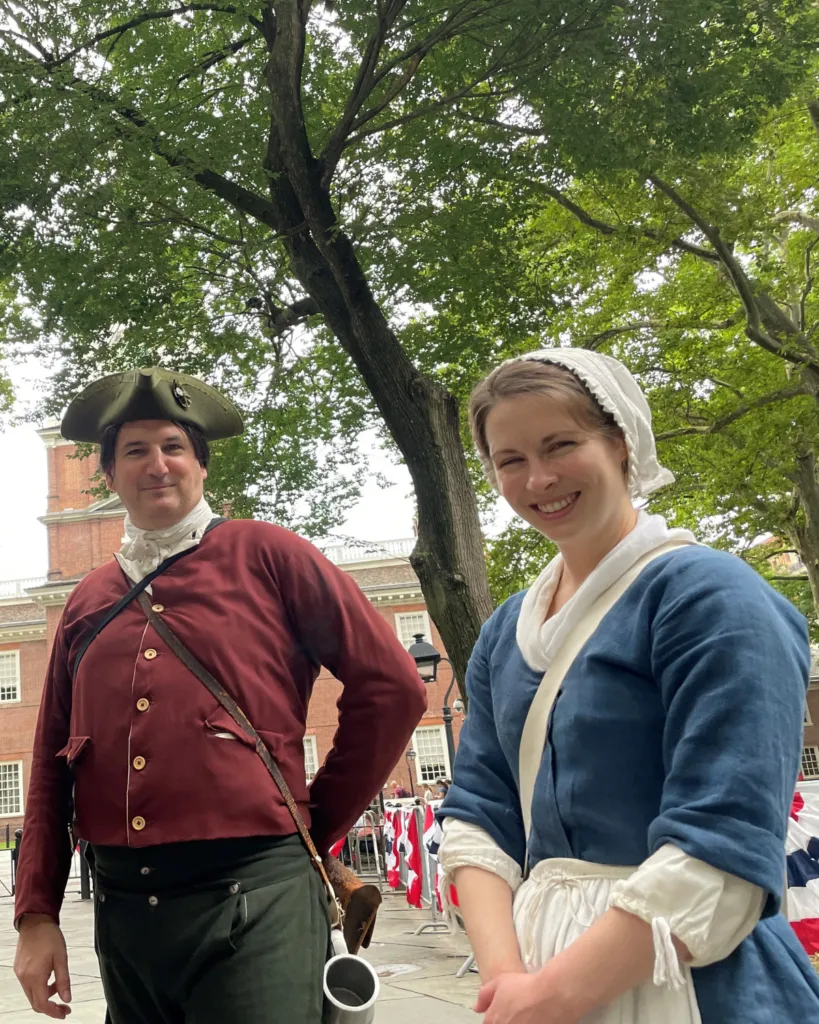 Costumed History Makers pose outside in colonial attire